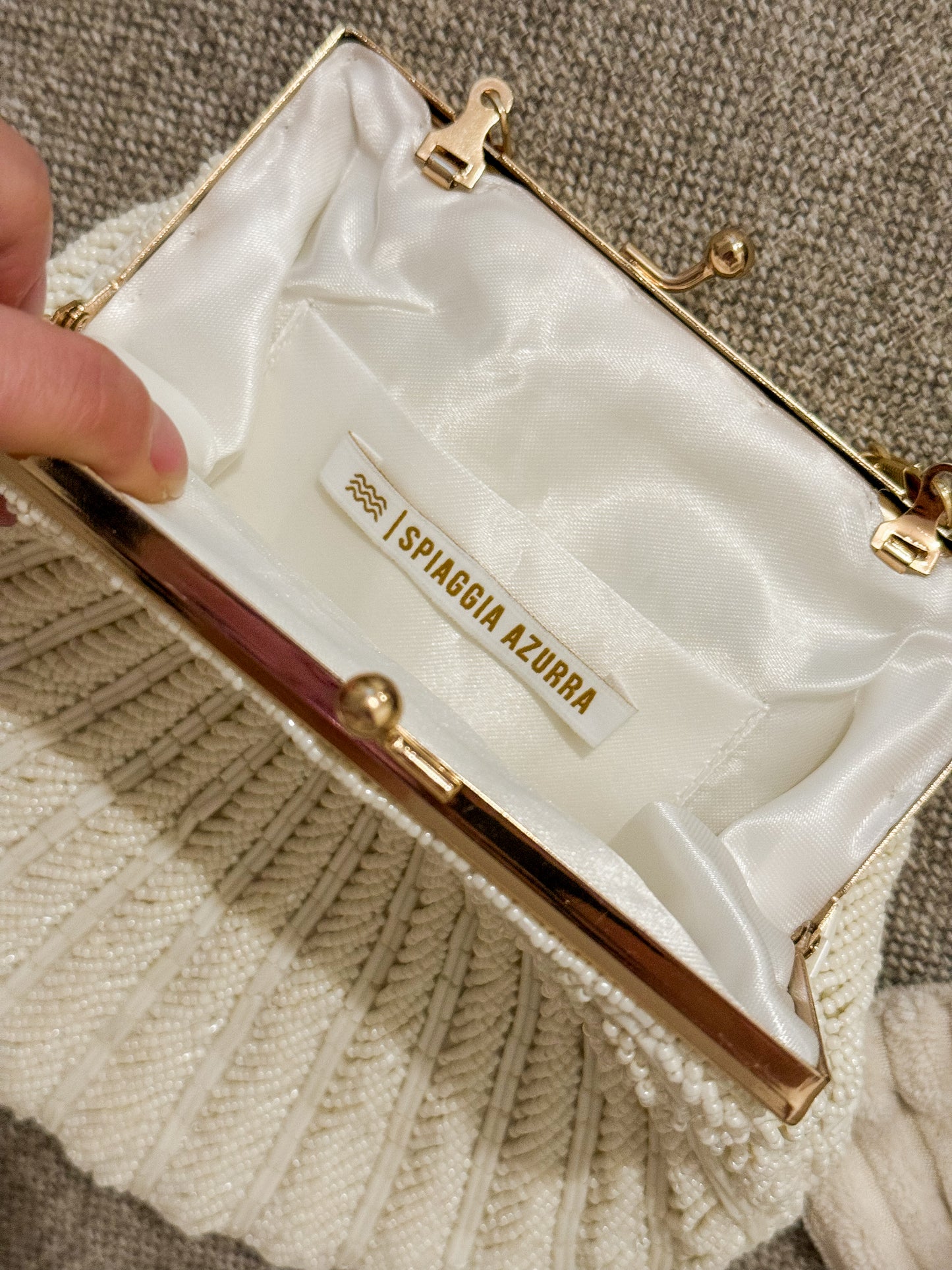 La Côte Belle clutch